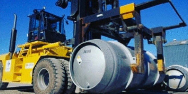 A truck on Wednesday carries a cylinder containing uranium hexafluoride gas for the purpose of injecting the gas into centrifuges in Iran's Fordo nuclear facility. (AP/Atomic Energy Organization of Iran)