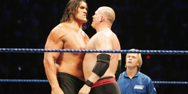 The Great Khali and ECW Champion Kane stare each other down during WWE Smackdown at Acer Arena on June 15, 2008 in Sydney, Australia. (Photo by Gaye Gerard/Getty Images)