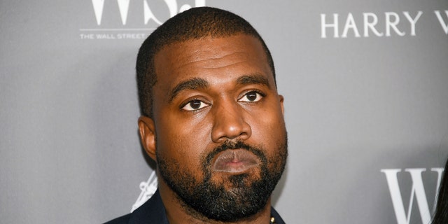 File - In this Nov. 6, 2019, file photo, Kanye West attends the WSJ. Magazine 2019 Innovator Awards at the Museum of Modern Art in New York. Officials in Wyoming have received a building permit application from Kanye West for a proposed amphitheater on property owned by the rapper. West recently announced that he plans to move the headquarters of his shoe and clothing company, Adidas Yeezy, to Cody. He also wants to build a 70,000-square-foot amphitheater on his 4,000-acre ranch. The Cody Enterprise reports the Park County Planning and Zoning Commission plans to discuss the proposal. (Photo by Evan Agostini/Invision/AP, File)