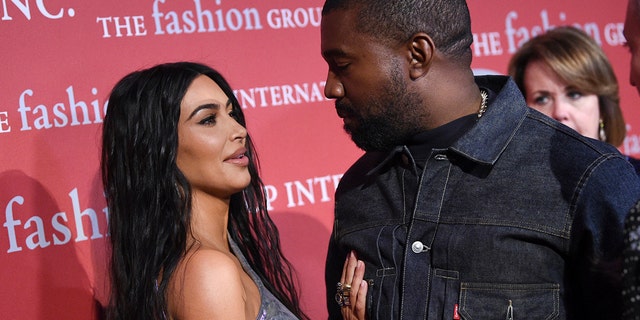 Recording artist Kanye West, right, and wife Kim Kardashian West attend The Fashion Group International's annual "Night of Stars" gala at Cipriani Wall Street on Thursday, Oct. 24, 2019, in New York.