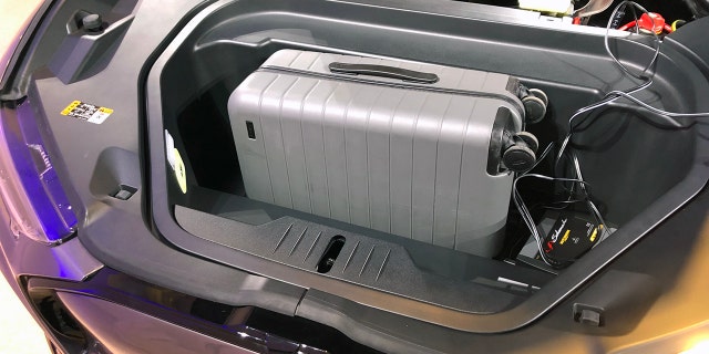 Note: The wires are part of a display, that's not how you pl;ug the car in.