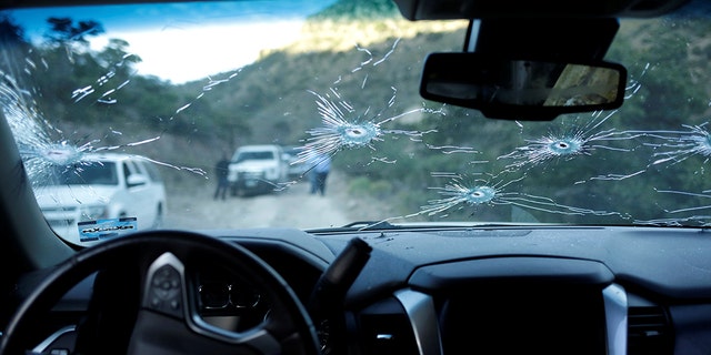 The interior of a bullet-riddled vehicle belonging to one of the families killed in the massacre. 