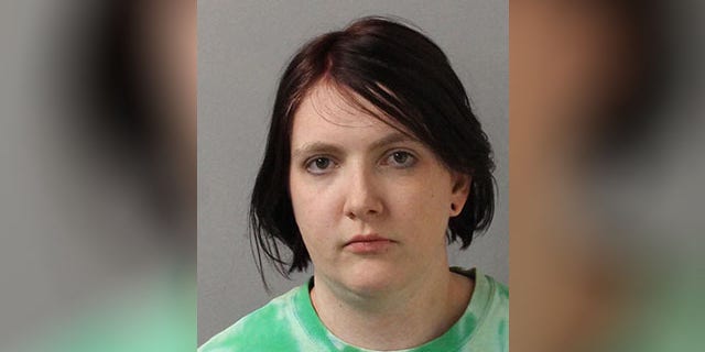 Julia Dueease was taken into custody on a charge of aggravated assault with a deadly weapon.