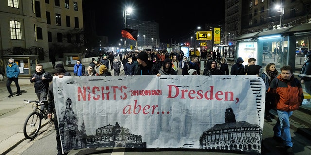 15 February 2019, Saxony, Dresden: Neo-Nazi marchers in Dresden meet counter-protesters Photo: Str./dpa
