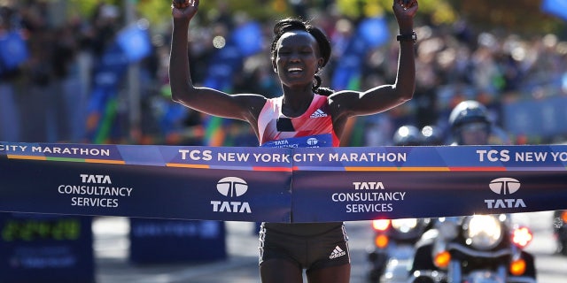 In this Nov. 6, 2016, file photo, Mary Keitany of Kenya crosses the finish line first in the women's division of the 2016 New York City Marathon. The 37-year-old from Kenya will try for her fifth women's title in six years at the New York City Marathon on Sunday, Nov. 3, 2019.