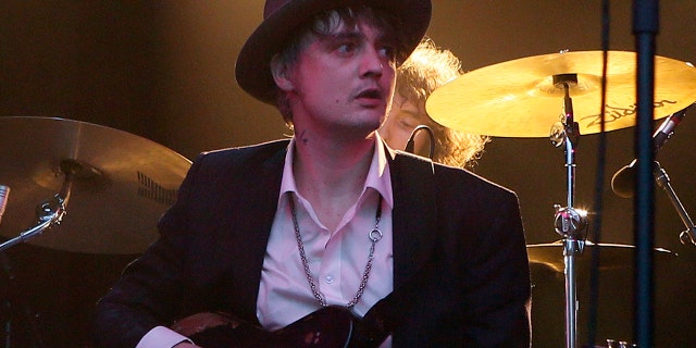 FILE - In this photo on May 4, 2017, British musician Pete Doherty plays on stage during a concert at Pa. Paris authorities say Doherty was arrested in Paris for buying drugs.
