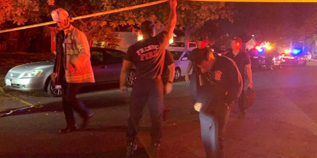 Police and other emergency responders at the shooting scene Sunday night in Fresno, Calif. (FOX 26 of Fresno)