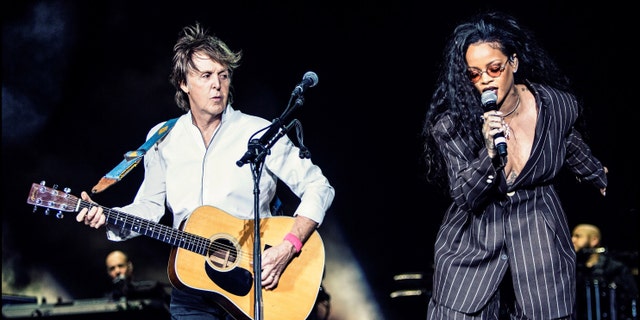 Paul McCartney (L) and Rihanna perform on Day 3 of Desert Trip Weekend 2 at the Empire Polo Field on October 15, 2016 in Indio, California. 