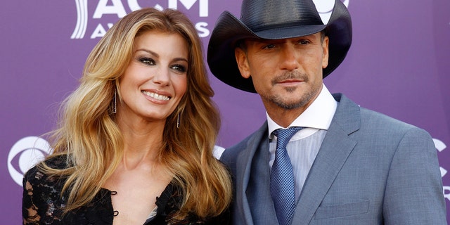 Singer Faith Hill and her husband Tim McGraw arrive at the 48th ACM Awards in Las Vegas April 7, 2013. 