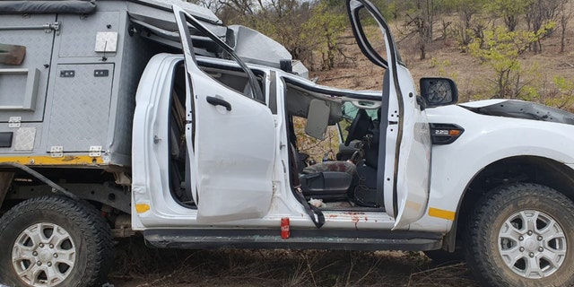 A tourist from Switzerland died after his rental safari vehicle was crushed by a giraffe that was struck by another vehicle on Saturday.