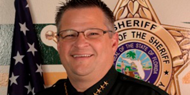 Brevard County Sheriff Wayne Ivey told Fox News he's not backing down after a group of atheists urged him to remove "In God We Trust" from the vehicles.