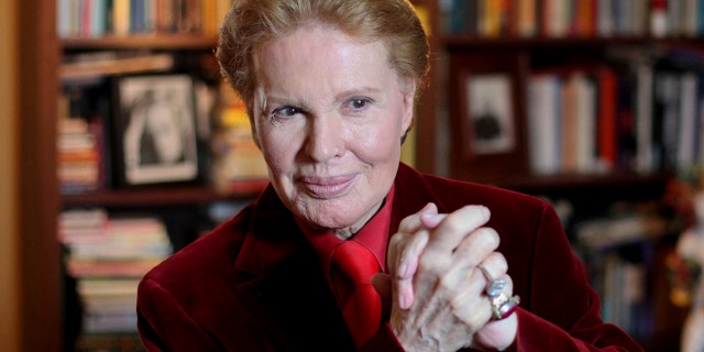 FILE - In this Feb. 14, 2012 file photo, Puerto Rican astrologer Walter Mercado, also known as Shanti Ananda, gives a press conference in San Juan, Puerto Rico. Mercado, a flamboyant astrologer and television personality whose daily TV appearances entertained many across Latin America for more than a decade, died on Nov. 26.