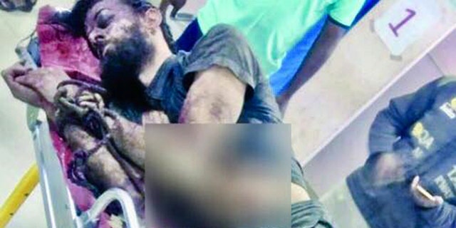 The villagers tied the tourist to a post and attacked him, police said.