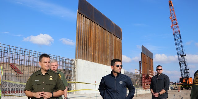 Acting DHS Secretary Chad Wolf tours new border wall construction in Texas.