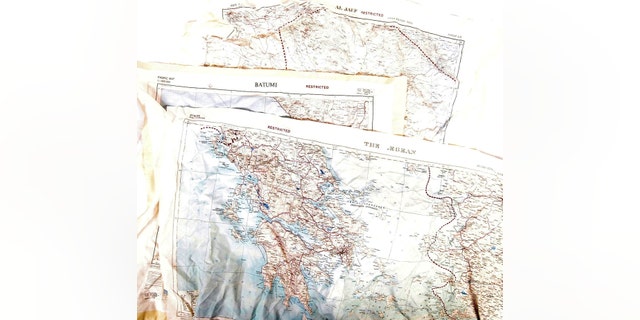 A rare collection of 4 original vintage WWII Escape & Evade RAF Pilot / Officer's maps on silk. Includes maps of Istanbul, Batumi, Al-Jawf, and Ankara. Each is double-sided and all are marked "restricted." (Credit: SWNS)