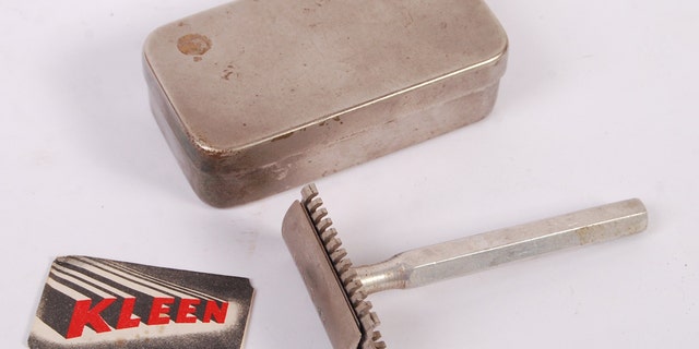 A rare WWII Second World War 1945 dated British SOE ( Special Operations Executive ) Escape & Evade razor, with a compass razor blade. The blade made by Kleen, and still present within its original paper envelope. (Credit: SWNS)