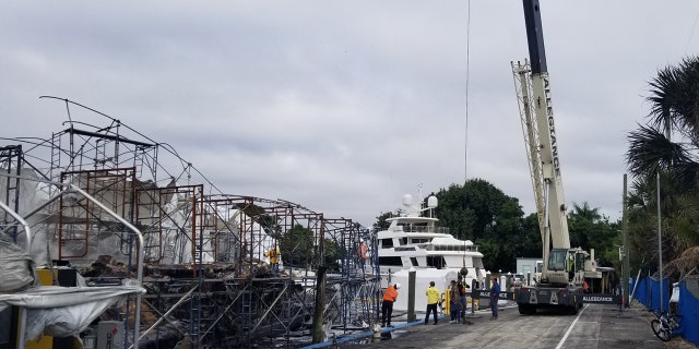 Aftermath of fire that destroyed two yachts worth $24 million in Fort Lauderdale Saturday.