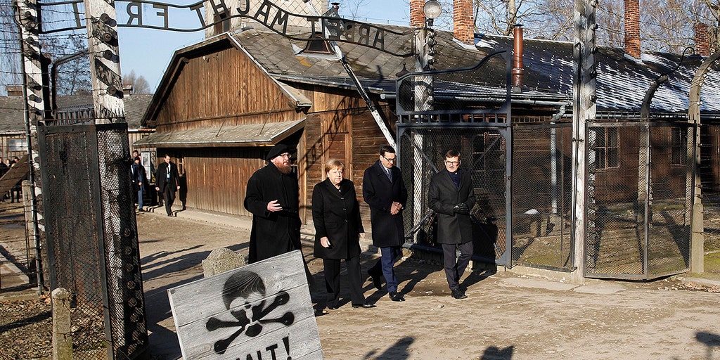 Germany's Angela Merkel visits Auschwitz for first time amid rising anti-Semitism