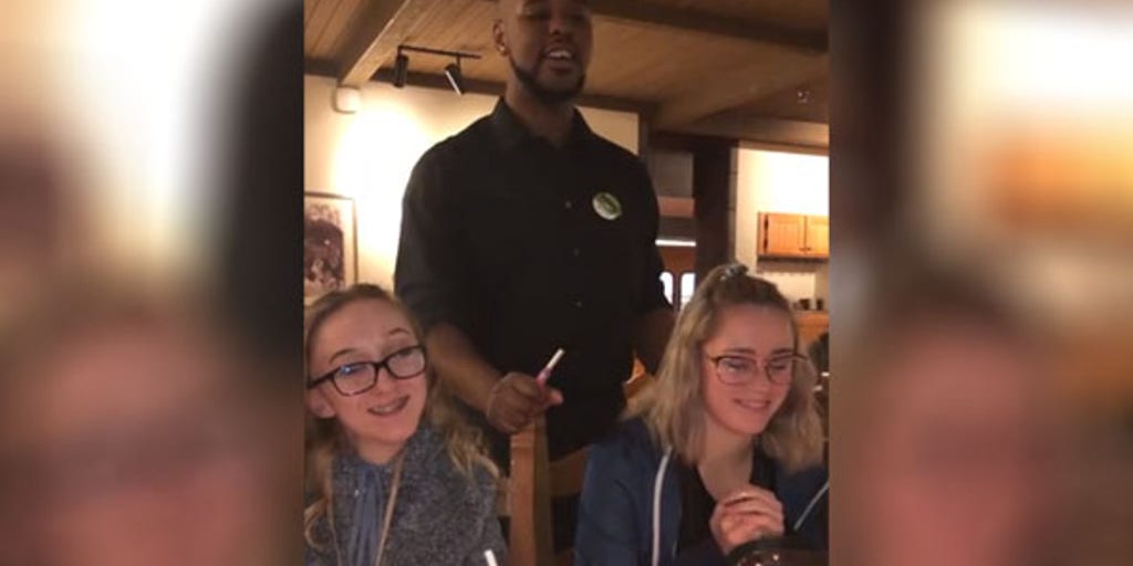 Washington Family Stunned By Olive Garden Waiter Singing Happy