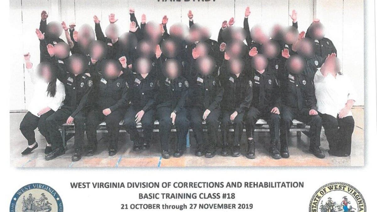 Multiple people have been either fired or suspended in connection with a photo that appeared to show corrections trainees giving a Nazi salute.  