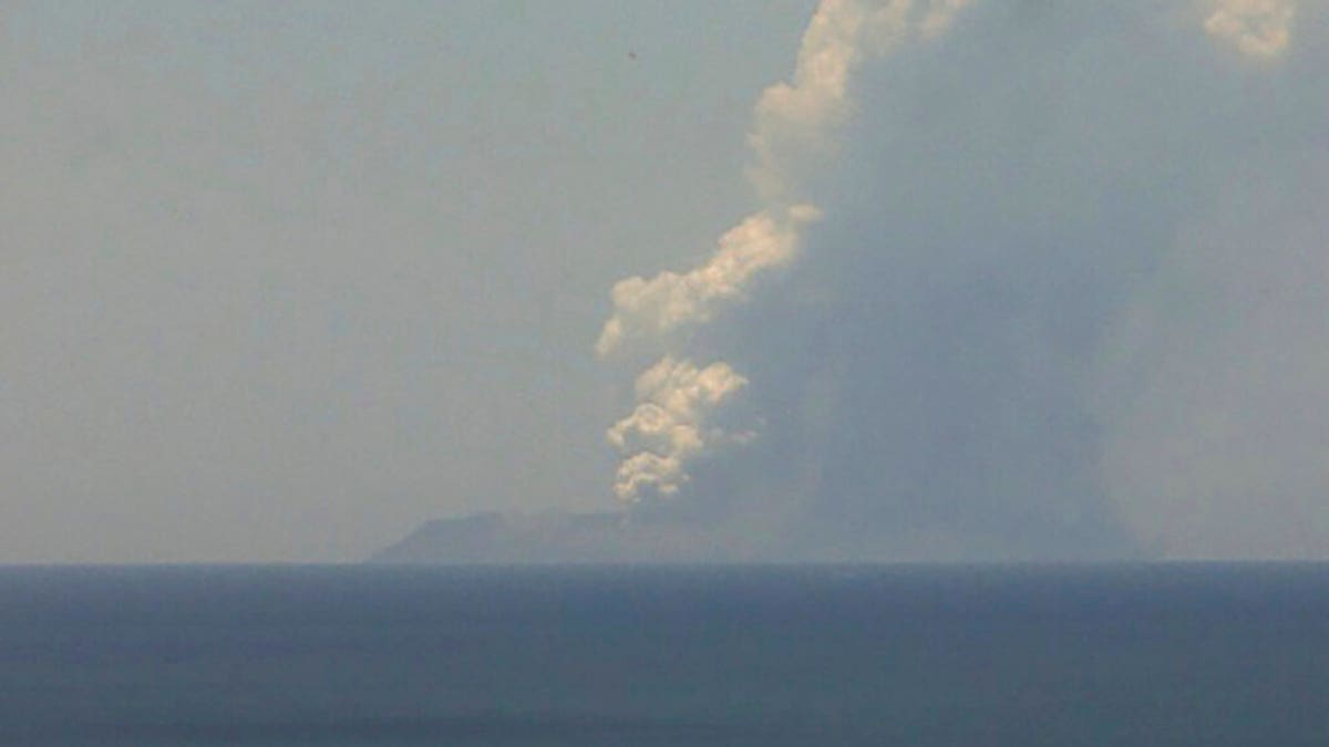 This image released by GNS Science, shows plumes of smoke from a volcanic eruption on White Island, seen from Whakatane, New Zealand Monday, Dec. 9, 2019. 