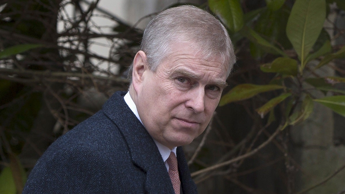 Britain's Prince Andrew leaves after attending the Easter Sunday service at St Georges Chapel at Windsor Castle in southern England.