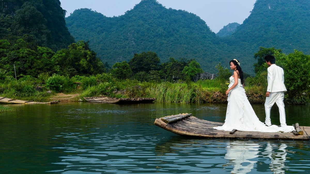 Actors stage a wedding on the Li River, in the Guangxi Province of China.