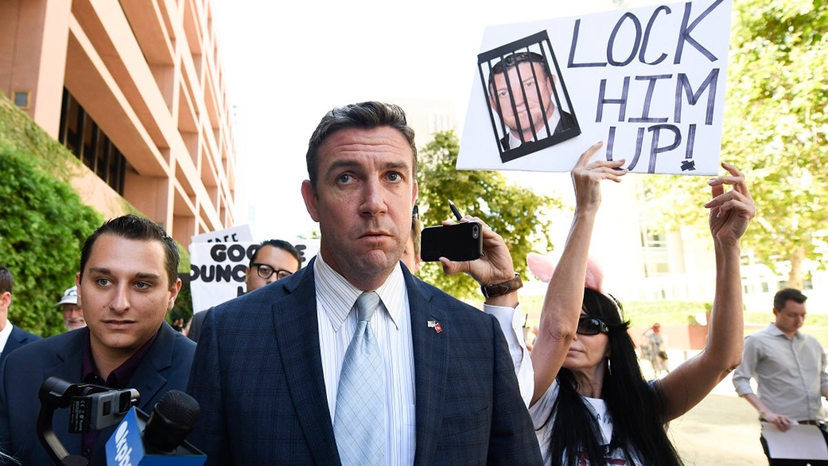 U.S. Rep. Duncan Hunter leaves San Diego federal court this past July. (AP Photo/Denis Poroy, File)