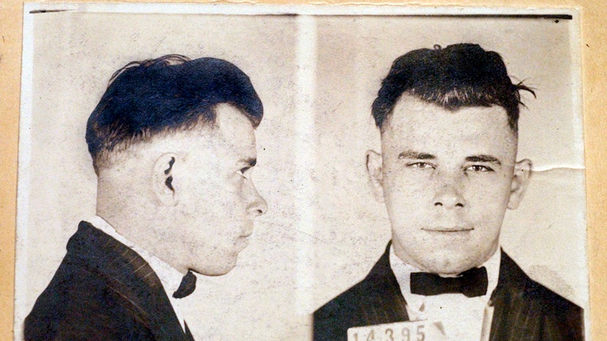 This undated file photo shows Indiana Reformatory booking shots of John Dillinger, stored in the state archives. A judge on Wednesday dismissed a lawsuit filed by a relative of the 1930s gangster against an Indianapolis cemetery who wants to exhume Dillinger’s gravesite to determine if the notorious criminal is actually buried there. (Indiana State Archives/The Indianapolis Star via AP, File)