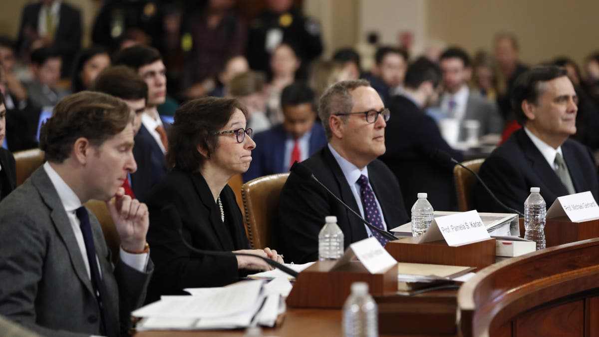 From left: Constitutional law experts Harvard Law School professor Noah Feldman, Stanford Law School professor Pamela Karlan, University of North Carolina Law School professor Michael Gerhardt and George Washington University Law School professor Jonathan Turley during a hearing before the House Judiciary Committee on the constitutional grounds for the impeachment of President Trump. (AP Photo/Andrew Harnik)