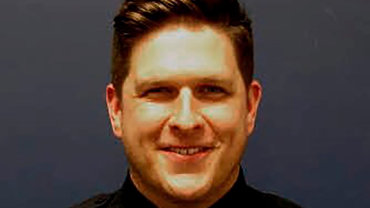 Houston police Sgt. Christopher Brewster, seen in an undated photo, was shot and killed Saturday evening, Dec. 7, 2019, by a man who had been reported for assault, authorities say. (Houston Police Department via AP)
