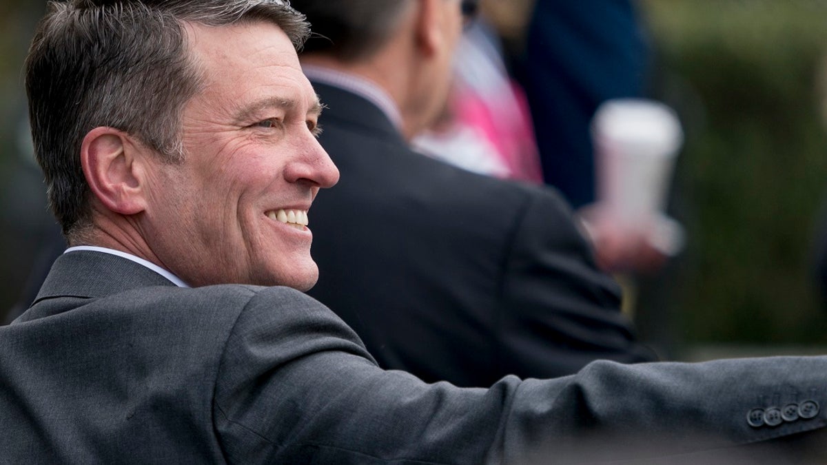 In this April 2, 2018, file photo, then-White House physician and nominee for Veterans Affairs Secretary Dr. Ronny Jackson arrives at the annual White House Easter Egg Roll on the South Lawn of the White House in Washington. Jackson is running as a Republican in 2020 for a rural congressional seat in Texas. (AP Photo/Andrew Harnik, File)