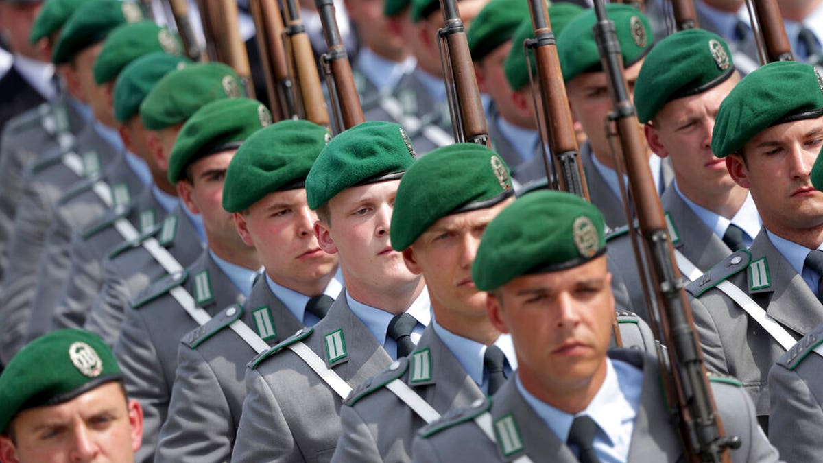 Soldiers attend an oath-taking ceremony of the German army at the Defence Ministry in Berlin, Germany.