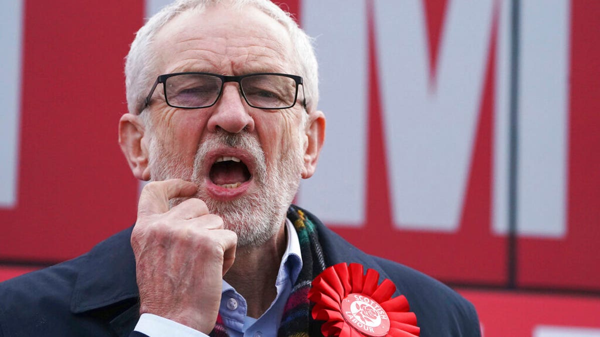 Labour Party leader Jeremy Corbyn gestures, at a rally in Stainton Village, on the last day of General Election campaigning, in Middlesbrough, England, Wednesday, Dec. 11, 2019. (Owen Humphreys/PA via AP)