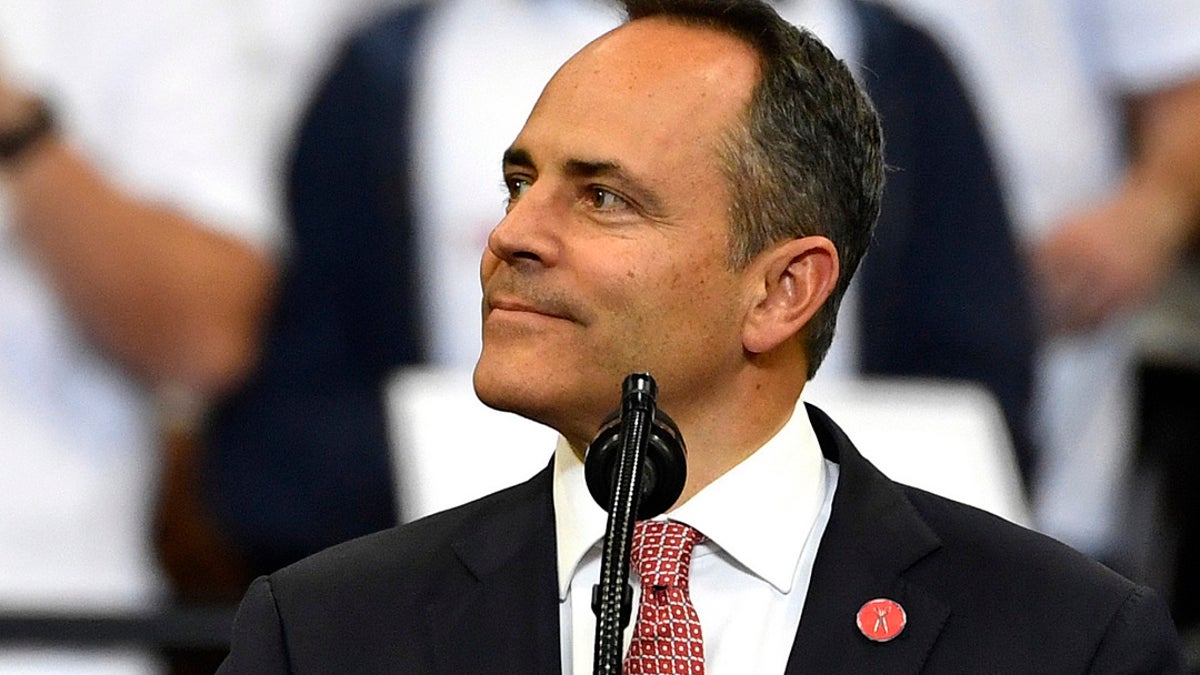 In this Nov. 4, 2019, file photo, Kentucky Gov. Matt Bevin looks out at the crowd during a campaign rally with President Donald Trump in Lexington, Ky. Bevin, who lost to Democrat Andy Beshear last month in a close race, is being criticized for comments he made during a Thursday radio interview about pardoning a man convicted of raping a young child. (AP Photo/Timothy D. Easley, File)