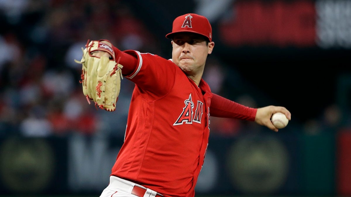 In this June 29, 2019, file photo, Los Angeles Angels starting pitcher Tyler Skaggs throws to the Oakland Athletics during a baseball game in Anaheim, Calif. Talks to add testing for opioids began following the death of Skaggs, who was found dead in his hotel room in the Dallas area July 1 before the start of a series against the Texas Rangers. (AP Photo/Marcio Jose Sanchez, File)