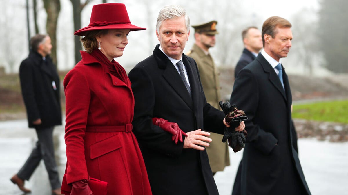 Belgium's King Philippe, center, Belgium's Queen Mathilde and Luxembourg's Grand Duke Henri, right, leave at the end of a ceremony to commemorate the 75th anniversary of the Battle of the Bulge at the Mardasson Memorial in Bastogne, Belgium on Monday, Dec. 16, 2019.