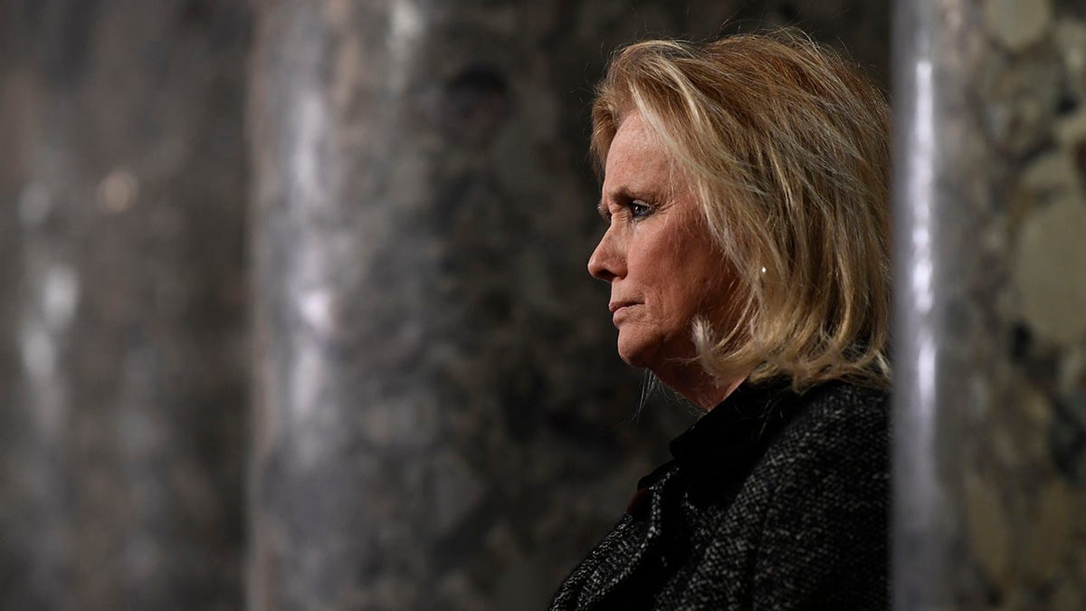 Rep. Debbie Dingell, D-Mich, speaks to reporters on Capitol Hill in Washington, Wednesday, Dec. 18, 2019. (AP Photo/Susan Walsh)