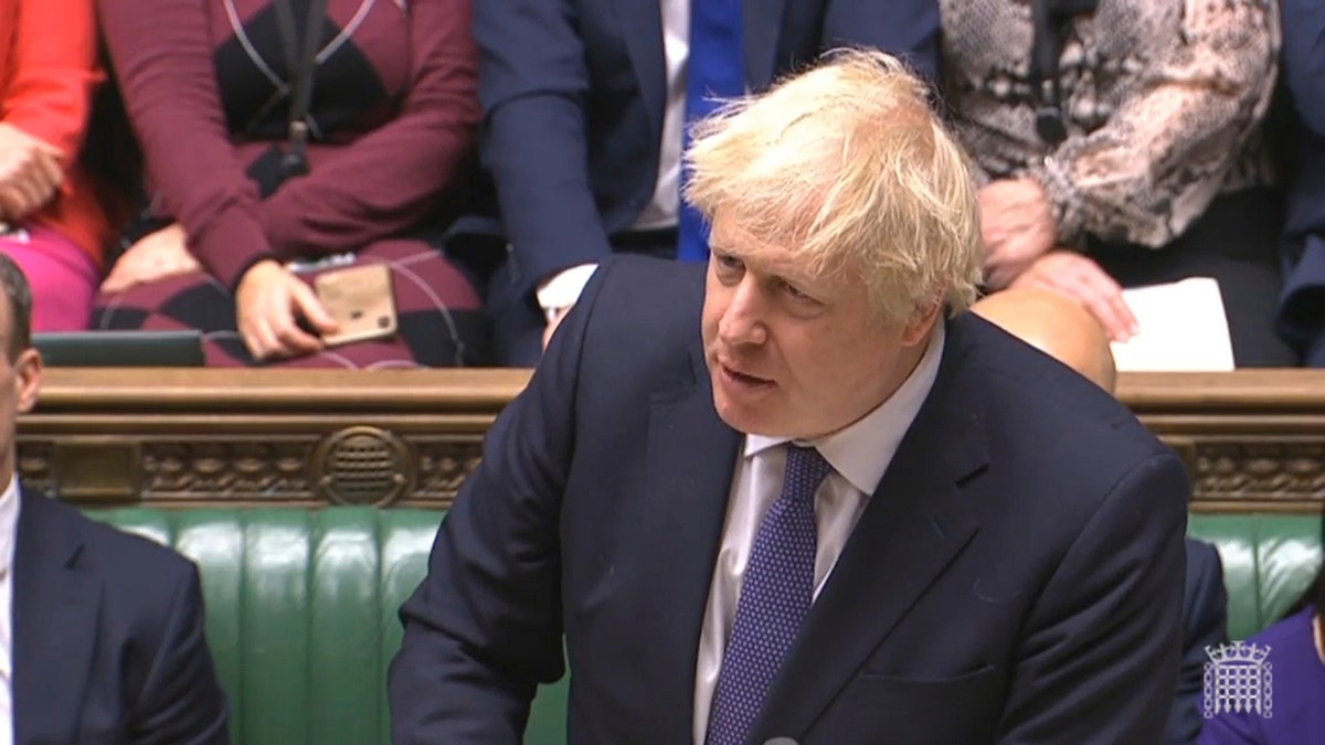 British Prime Minister Boris Johnson speaks during the Brexit debate on The European Union (Withdrawal Agreement) Bill in the House of Commons in London, Friday Dec. 20, 2019. (House of Commons via AP)