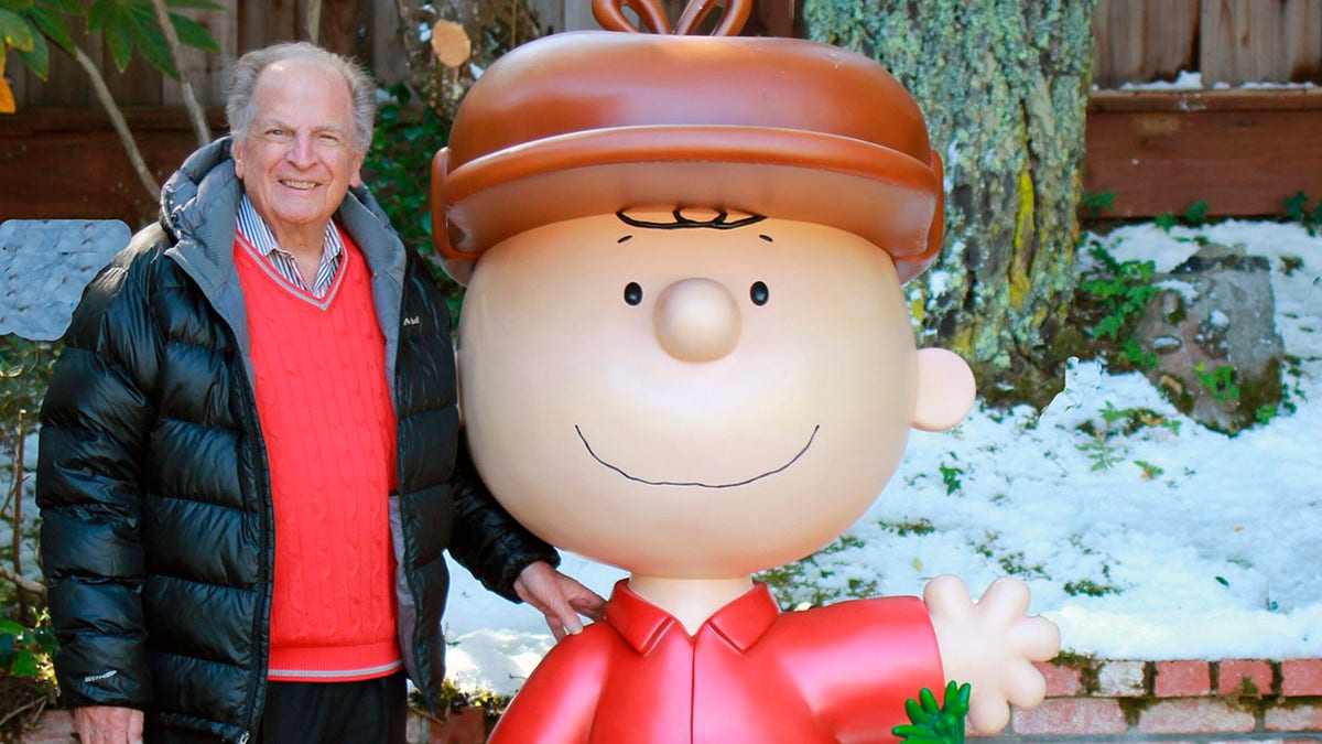 This 2015 photo provided by Jason Mendelson shows Lee Mendelson in Hillsborough, Calif. Lee Mendelson, the producer who changed the face of the holidays when he brought "A Charlie Brown Christmas" to television in 1965 and wrote the lyrics to its signature song, "Christmas Time Is Here," died on Christmas Day, Wednesday, Dec. 25, 2019. (Jason Mendelson via AP)