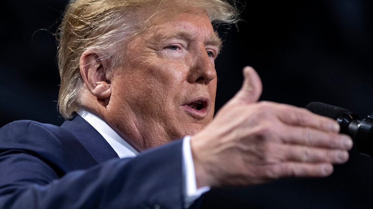 In this Dec. 18, 2019 file photo President Donald Trump speaks during a campaign rally at Kellogg Arena, in Battle Creek, Mich. (AP Photo/ Evan Vucci, File)