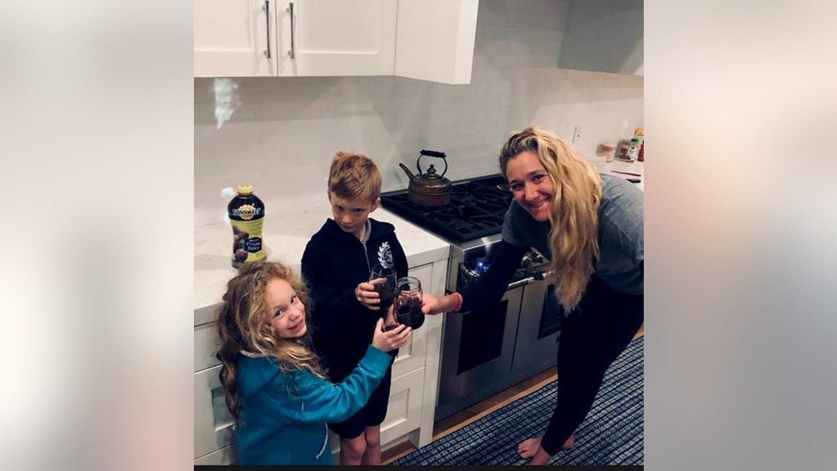 Walsh Jennings, pictured with two of her children, said providing a good nutritional example for her kids is a key part of her parenting.