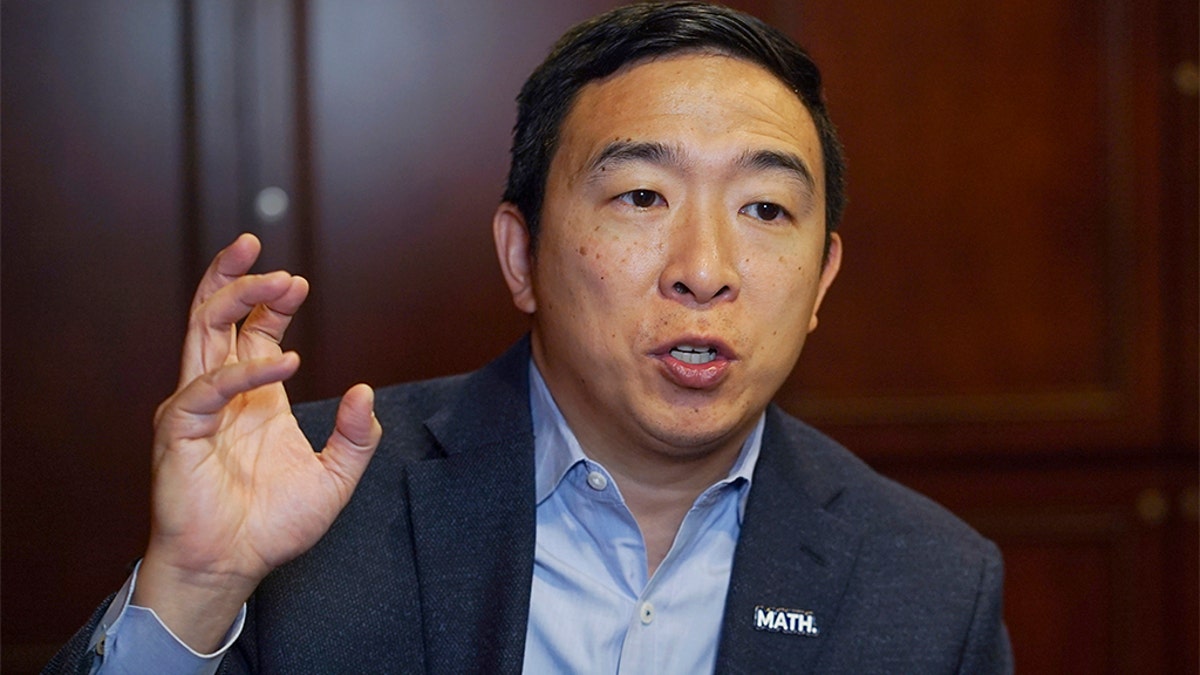In this Dec. 5, 2019, photo, Democratic presidential candidate businessman Andrew Yang speaks during an interview with The Associated Press in Chicago. (AP Photo/Teresa Crawford)