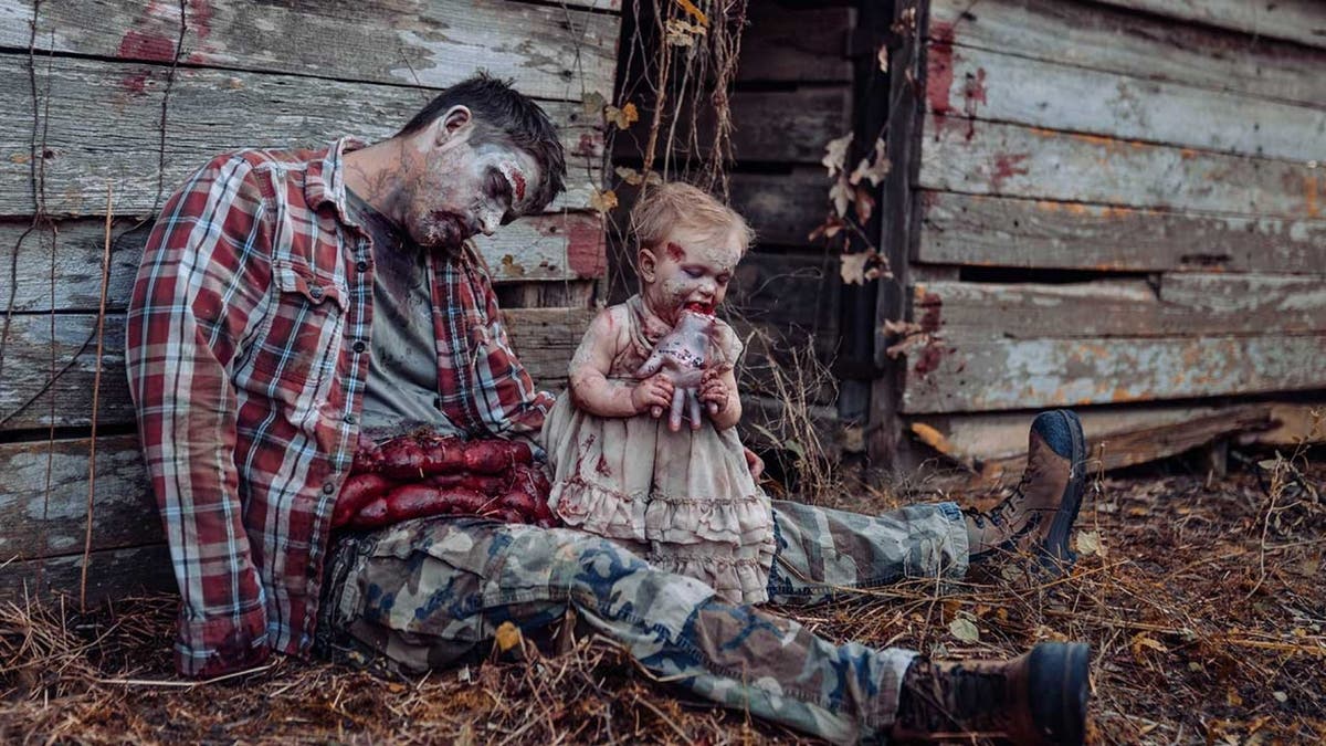 In honor of the spookiest day of the year, one Alabama mom staged a frightful Halloween-inspired photo shoot, depicting her husband and 11-month-old daughter as zombies, that immediately went viral online. (Tifflynn Photography)