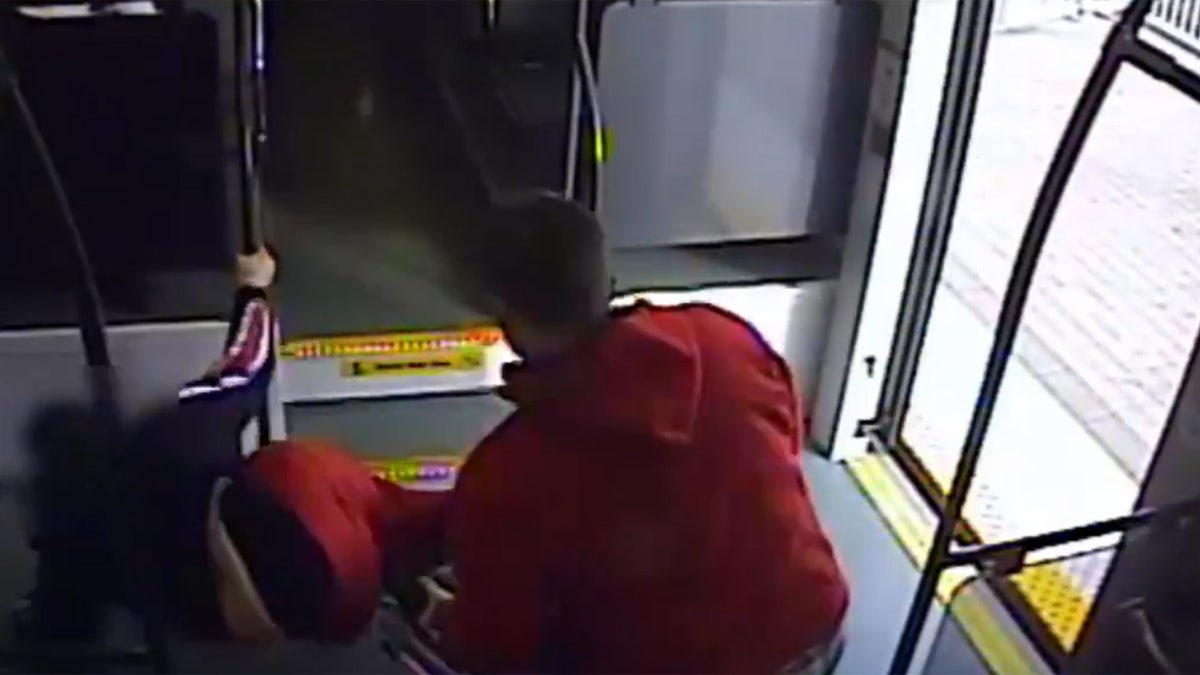 Austin Shurbutt is seen dumping a woman on the floor of a train from her wheelchair on Friday, Nov. 29.