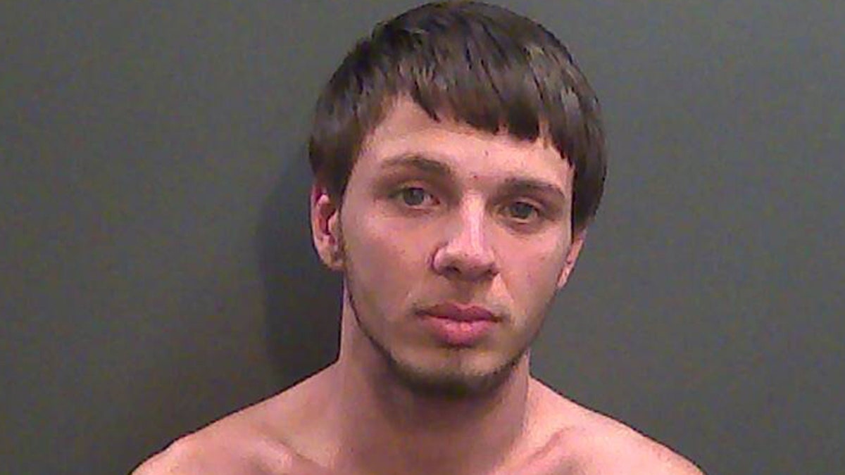Austin Mark Smith, 22, was arrested and charged after his driver, 19-year-old Annalysa McMillan, was killed on Tuesday. 