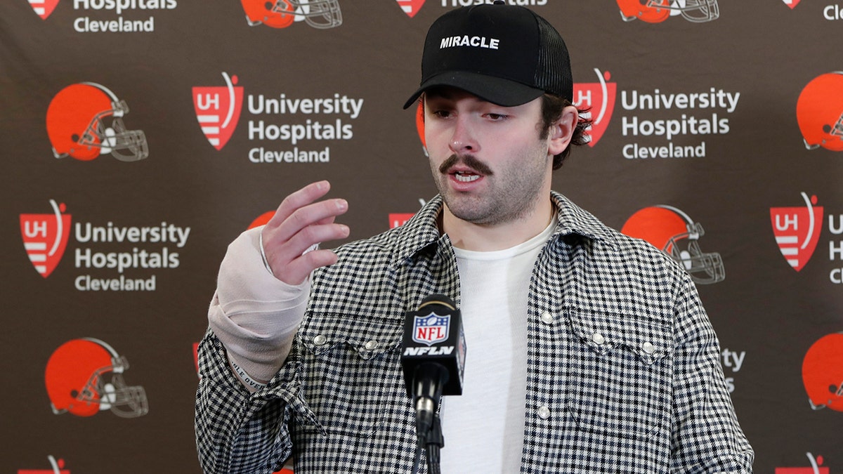 Cleveland Browns quarterback Baker Mayfield answers questions about his injured hand during a news conference after an NFL football game against the Pittsburgh Steelers, Sunday, Dec. 1, 2019, in Pittsburgh. (AP Photo/Don Wright)