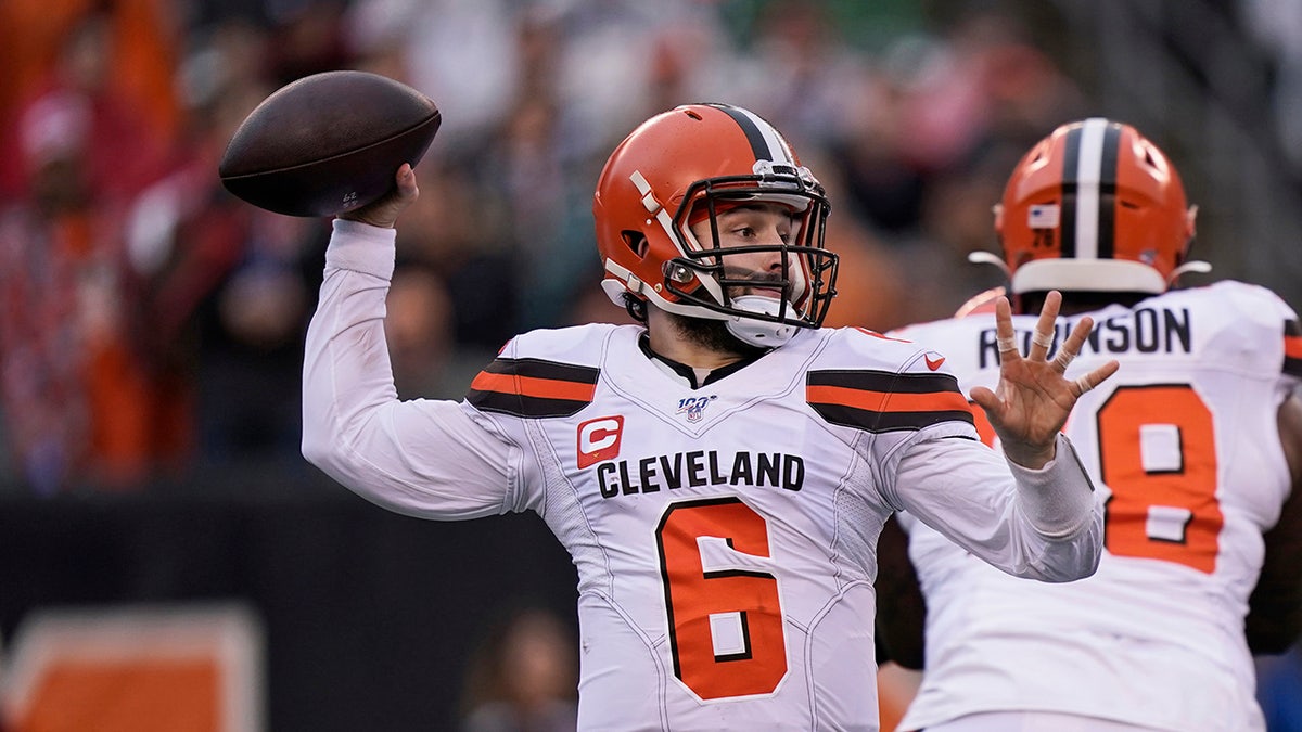 Cleveland Browns quarterback Baker Mayfield throws during the first half of an NFL football game against the Cincinnati Bengals, Sunday, Dec. 29, 2019, in Cincinnati. (AP Photo/Bryan Woolston)