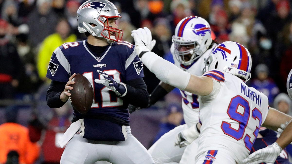 Tom Brady throws a pass