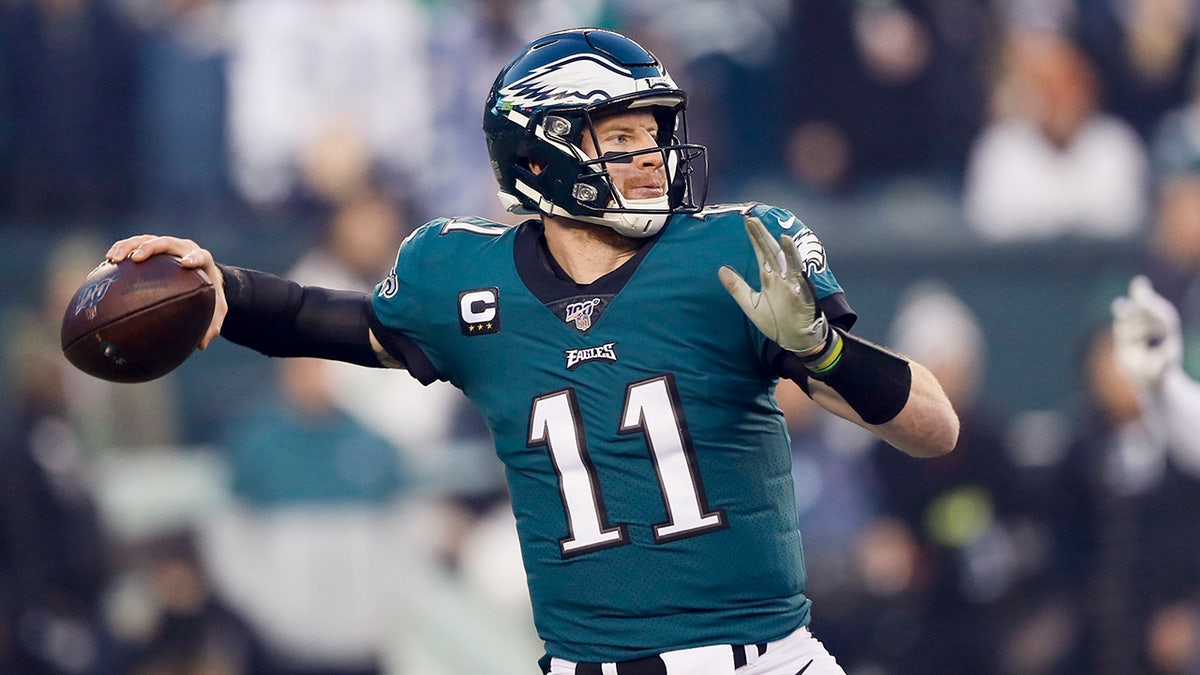 Philadelphia Eagles quarterback Carson Wentz throws a pass during the first half of an NFL football game against the Dallas Cowboys Sunday, Dec. 22, 2019, in Philadelphia. (AP Photo/Michael Perez)